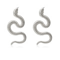 Personnalité Boucles d&#39;oreilles en hip-hop géométrique torsadées, boucles d&#39;oreilles longues en forme de serpent exagérées
